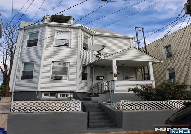 Photo 1 of Multi family home for sale at 124 Albion Ave, Paterson, NJ 07502 | MLS# 26038954 | Listing updated on 2026-10-18