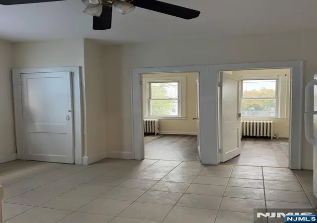 Photo 3 of Multi family home for sale at 124 Albion Ave, Paterson, NJ 07502 | MLS# 26038954 | Listing updated on 2026-10-18