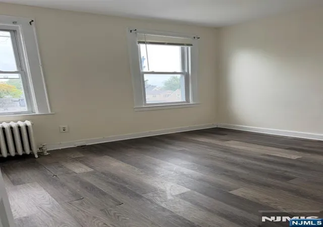 Photo 4 of Multi family home for sale at 124 Albion Ave, Paterson, NJ 07502 | MLS# 26038954 | Listing updated on 2026-10-18