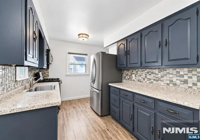 Photo 3 of Single family home for sale at 49 Warren St, Clifton, NJ 07013 | MLS# 26038981 | Listing updated on 2026-10-28