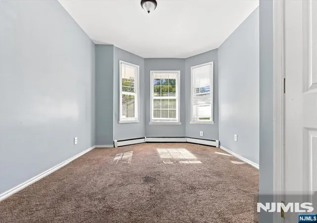 Photo 3 of Multi family home for sale at 293 Ogden St, Orange, NJ 07050 | MLS# 26039160 | Listing updated on 2026-10-14