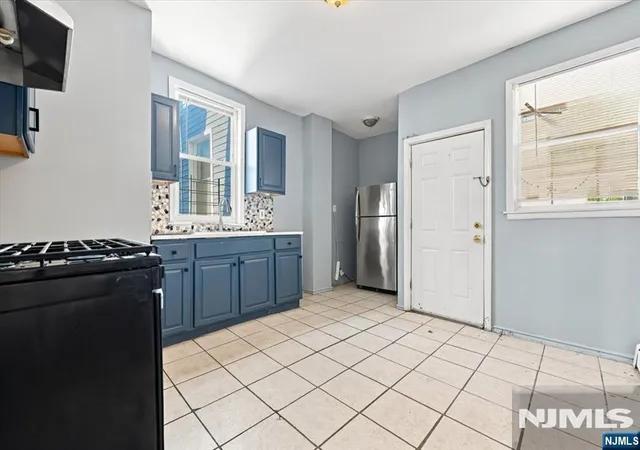 Photo 3 of Multi family home for sale at 293 Ogden St, Orange, NJ 07050 | MLS# 26039160 | Listing updated on 2026-10-14