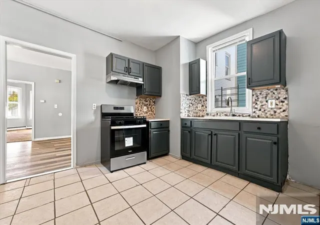Photo 4 of Multi family home for sale at 293 Ogden St, Orange, NJ 07050 | MLS# 26039160 | Listing updated on 2026-10-14