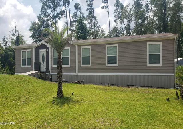 Photo 1 of Manufactured home for sale at 9125 Merlin Dr, Youngstown, FL 32466 | MLS# 777831 | Listing updated on 2026-08-17