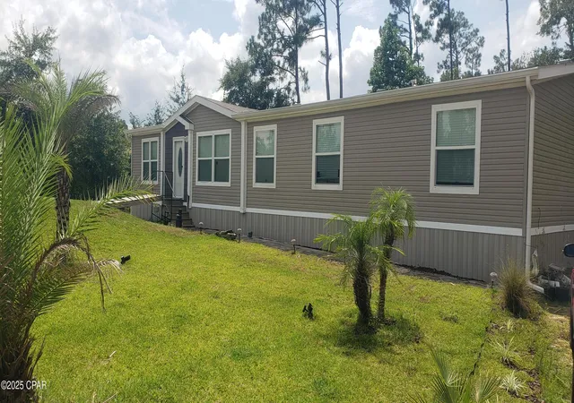 Photo 3 of Manufactured home for sale at 9125 Merlin Dr, Youngstown, FL 32466 | MLS# 777831 | Listing updated on 2026-08-17
