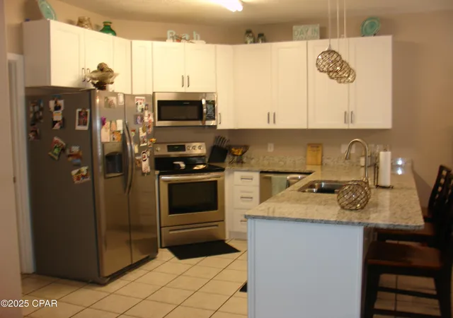 Photo 3 of Townhouse for sale at 6212 N Lagoon Dr, Panama City, FL 32408 | MLS# 778804 | Listing updated on 2026-08-25