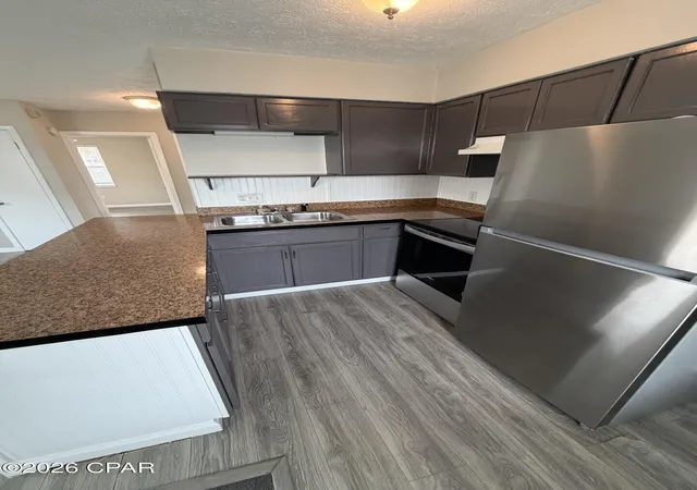 Listing Photo 4 - Condo for sale in building located at 6218 Hilltop Ave, Panama City, FL 32408 - Unit #A,B,C