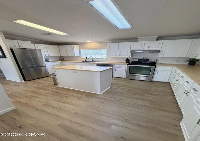 Photo 3 of Manufactured home for sale at 26738 Ne County Rd 69a, Altha, FL 32421 | MLS# 788878 | Listing updated on 2026-09-05