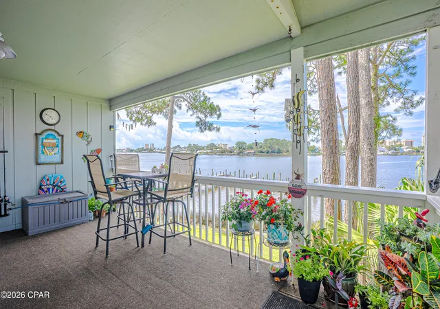 Listing Photo 1 - Condo for sale in building located at 6909 N Lagoon Dr, Panama City Beach, FL 32408 - Unit #E2