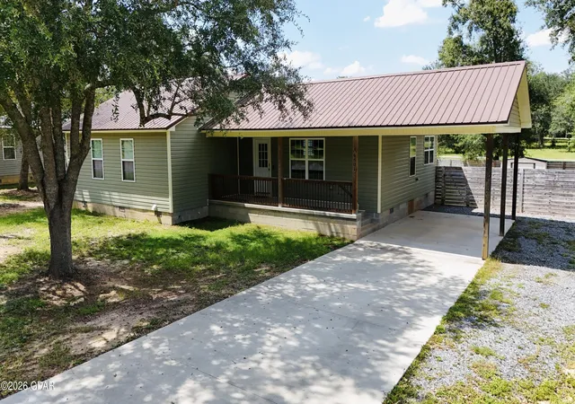 Single family home for sale at 6601 Grande Oak Loop, Grand Ridge, FL 32442 | MLS# 793608