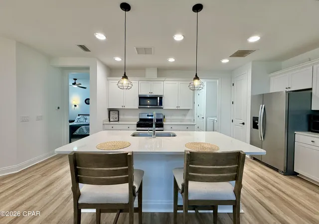 Photo 1 of Townhouse for sale at 8994 Parrot Pl, Panama City Beach, FL 32413 | MLS# 793948 | Listing updated on 2026-09-07