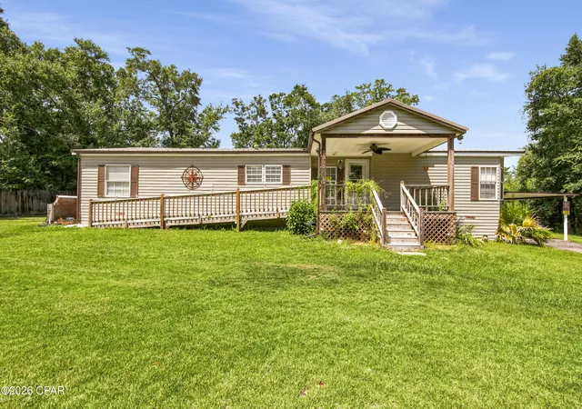 Photo 2 of Manufactured home for sale at 8843 S Mccann Rd, Southport, FL 32409 | MLS# 794525 | Listing updated on 2026-09-26