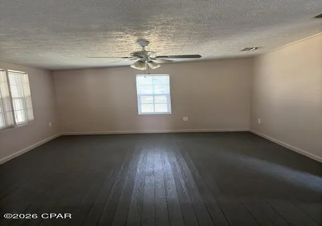 Photo 2 of Single family home for sale at 13606 Fiddlers Green Rd, Southport, FL 32409 | MLS# 794616 | Listing updated on 2026-09-24