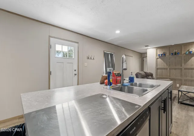 Photo 3 of Manufactured home for sale at 21835 Lake Mckenzie Blvd, Altha, FL 32421 | MLS# 795275 | Listing updated on 2026-09-11
