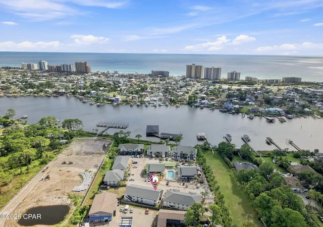 Photo 1 of Condo for sale at 7813 N Lagoon Dr #4E, Panama City, FL 32408 | MLS# 795340 | Listing updated on 2026-09-13