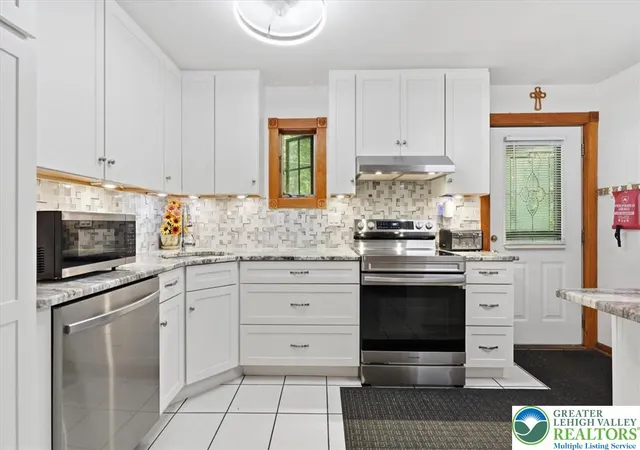 Photo 1 of Single family home for sale at 677 Clubhouse Dr, East Stroudsburg, PA 18302 | MLS# 780209 | Listing updated on 2026-09-05