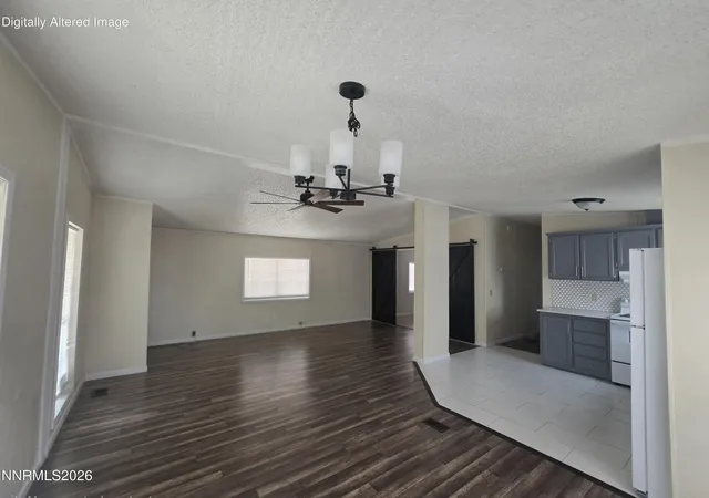 Photo 2 of Manufactured home for sale at 216 Garnet Cir, Mound House, NV 89706 | MLS# 260011358 | Listing updated on 2026-09-25