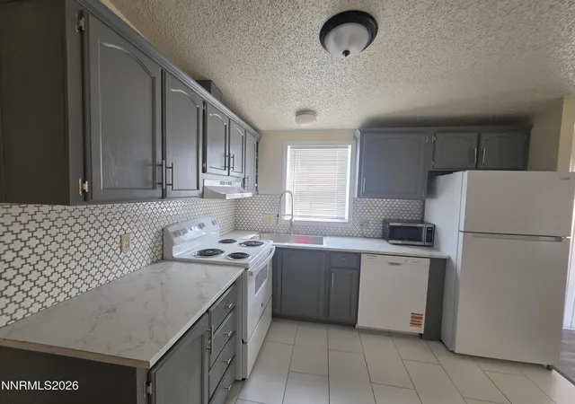 Photo 3 of Manufactured home for sale at 216 Garnet Cir, Mound House, NV 89706 | MLS# 260011358 | Listing updated on 2026-09-25