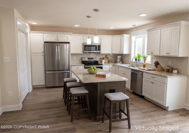 Photo 2 of Single family home for sale at 411 Pierce Ln, East Stroudsburg, PA 18301 | MLS# PM-132394 | Listing updated on 2026-09-01