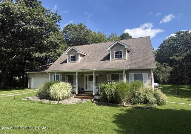 Photo 1 of Single family home for sale at 142 Stillwater Dr, Pocono Summit, PA 18346 | MLS# PM-140849 | Listing updated on 2026-09-17