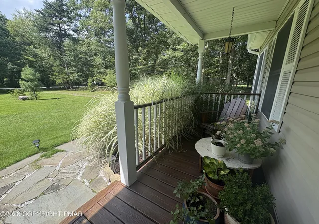 Photo 3 of Single family home for sale at 142 Stillwater Dr, Pocono Summit, PA 18346 | MLS# PM-140849 | Listing updated on 2026-09-17