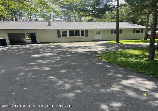 Photo 33 of Single family home for sale at 4107 Azalea Dr, Pocono Summit, PA 18346 | MLS# PM-144408 | Listing updated on 2026-09-03