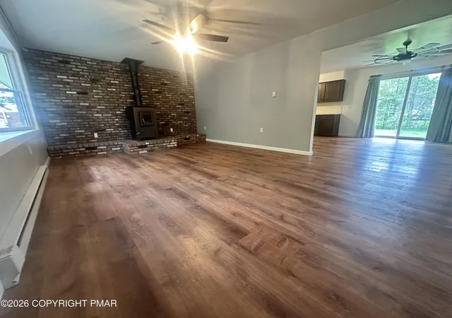 Photo 2 of Single family home for sale at 4107 Azalea Dr, Pocono Summit, PA 18346 | MLS# PM-144408 | Listing updated on 2026-09-03
