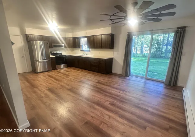 Photo 3 of Single family home for sale at 4107 Azalea Dr, Pocono Summit, PA 18346 | MLS# PM-144408 | Listing updated on 2026-09-03