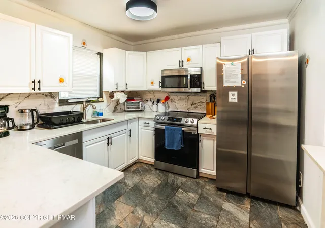 Photo 2 of Single family home for sale at 9688 Stony Holw Dr, Tobyhanna, PA 18466 | MLS# PM-144457 | Listing updated on 2026-09-09