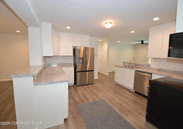 Photo 4 of Single family home for sale at 107 Sleepy Holw Ln, East Stroudsburg, PA 18302 | MLS# PM-144588 | Listing updated on 2026-09-15