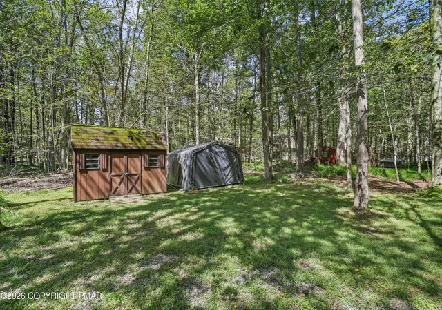 Photo 4 of Single family home for sale at 167 Wyomissing Dr, Pocono Lake, PA 18347 | MLS# PM-144533 | Listing updated on 2026-09-07