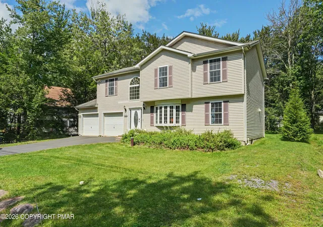 Photo 1 of Single family home for sale at 220 Nadine Blvd, Pocono Summit, PA 18346 | MLS# PM-144580 | Listing updated on 2026-09-09