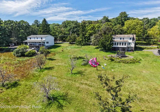 Photo 2 of Multi family home for sale at 1424 Twin Pine Rd, Stroudsburg, PA 18360 | MLS# PM-144549 | Listing updated on 2026-09-21