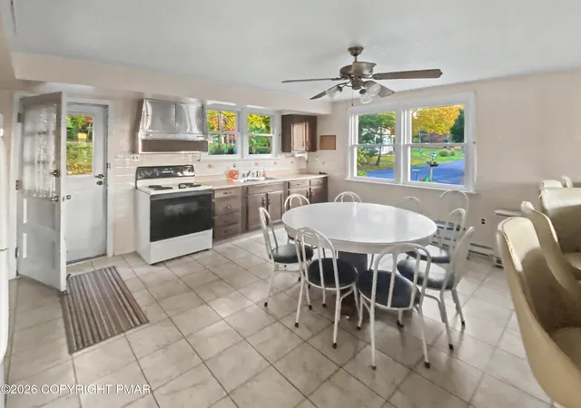 Photo 3 of Multi family home for sale at 1424 Twin Pine Rd, Stroudsburg, PA 18360 | MLS# PM-144549 | Listing updated on 2026-09-21