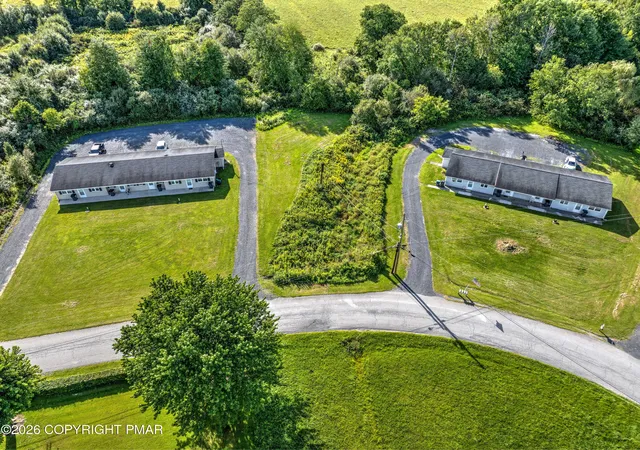 Photo 3 of Multi family home for sale at 213 Lamplight Dr, Brodheadsville, PA 18322 | MLS# PM-144630 | Listing updated on 2026-10-05
