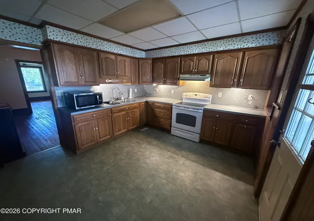 Photo 3 of Sale Pending at 26-28 N Green St, East Stroudsburg, PA 18301 | MLS# PM-144572 | Listing updated on 2026-09-10