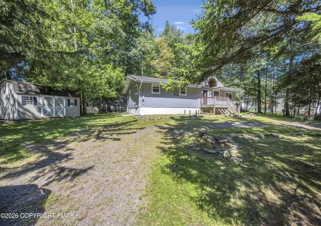 Photo 2 of Single family home for sale at 5262 Holiday Dr, Pocono Summit, PA 18346 | MLS# PM-144621 | Listing updated on 2026-09-10