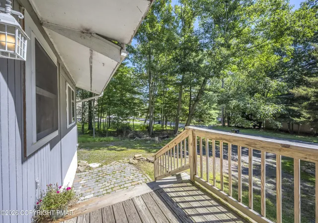 Photo 2 of Single family home for sale at 5262 Holiday Dr, Pocono Summit, PA 18346 | MLS# PM-144621 | Listing updated on 2026-09-10