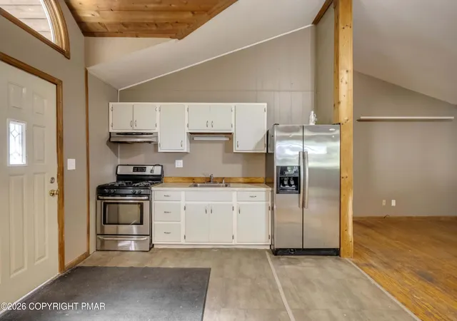 Photo 3 of Single family home for sale at 5262 Holiday Dr, Pocono Summit, PA 18346 | MLS# PM-144621 | Listing updated on 2026-09-10