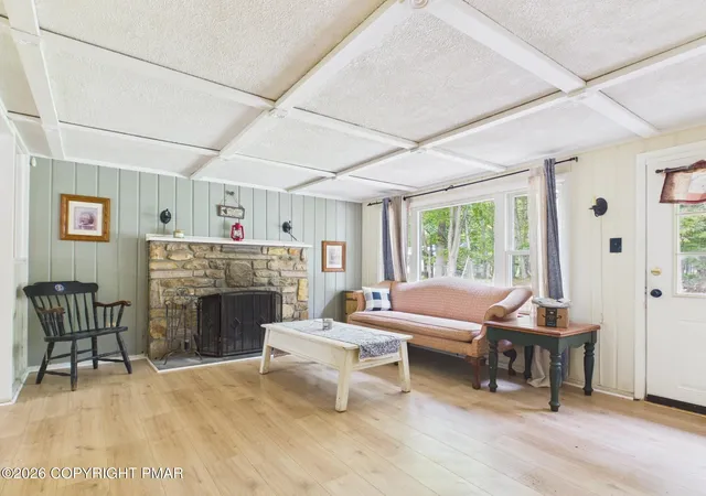 Photo 3 of Single family home for sale at 142 Chippewa Dr, Pocono Lake, PA 18347 | MLS# PM-144858 | Listing updated on 2026-09-18