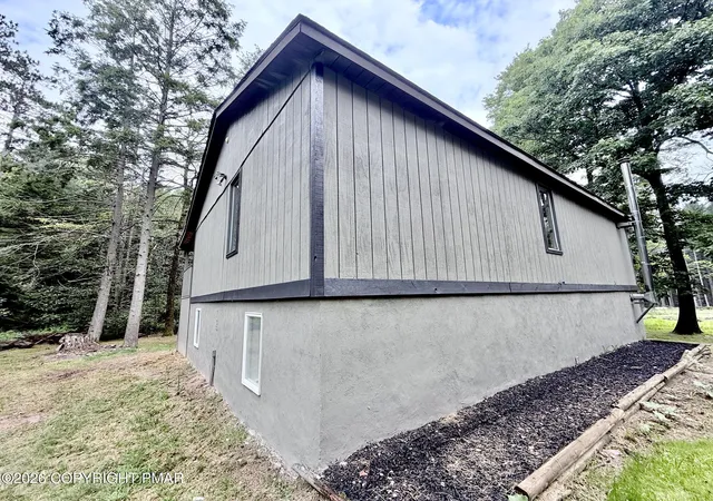 Photo 3 of Single family home for sale at 136 Pine Run, Pocono Lake, PA 18347 | MLS# PM-144988 | Listing updated on 2026-09-23