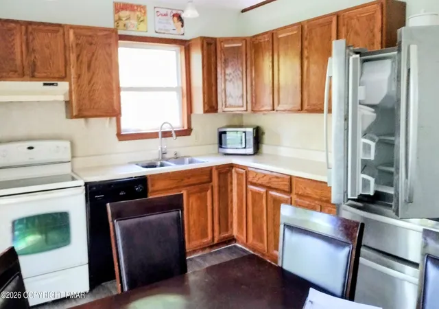 Photo 3 of Single family home for sale at 235 Paxinos Dr, Pocono Lake, PA 18347 | MLS# PM-145003 | Listing updated on 2026-10-05