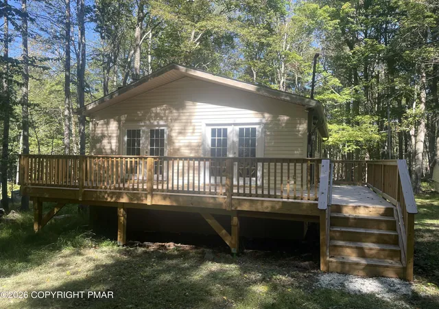 Photo 2 of Single family home for sale at 1047 Maple Dr, Pocono Lake, PA 18347 | MLS# PM-145081 | Listing updated on 2026-10-14