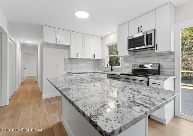 Photo 2 of Single family home for sale at 401 Schoolhouse Rd, East Stroudsburg, PA 18302 | MLS# PM-145101 | Listing updated on 2026-10-19