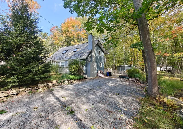 Photo 1 of Single family home for sale at 215 Yuma Trl, Pocono Lake, PA 18347 | MLS# PM-145276 | Listing updated on 2026-10-07