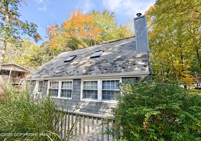 Photo 2 of Single family home for sale at 215 Yuma Trl, Pocono Lake, PA 18347 | MLS# PM-145276 | Listing updated on 2026-10-07