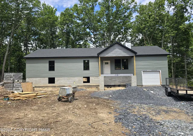 Photo 2 of Single family home for sale at 604 Gandolf Rd, Tamiment, PA 18371 | MLS# PM-145315 | Listing updated on 2026-10-05