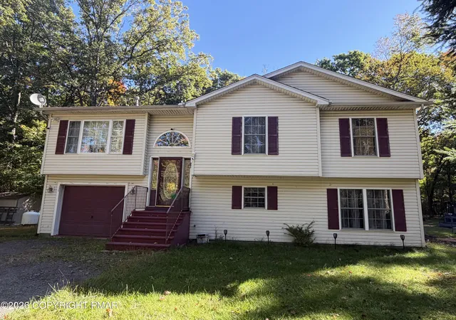 Photo 1 of Single family home for sale at 5257 Hummingbird Dr, Pocono Summit, PA 18346 | MLS# PM-145527 | Listing updated on 2026-10-18