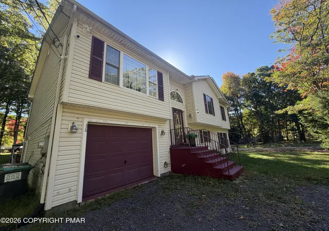 Photo 2 of Single family home for sale at 5257 Hummingbird Dr, Pocono Summit, PA 18346 | MLS# PM-145527 | Listing updated on 2026-10-18