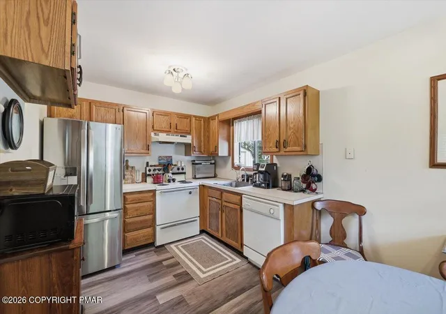 Photo 3 of Single family home for sale at 456 Maxatawny Dr, Pocono Lake, PA 18347 | MLS# PM-145421 | Listing updated on 2026-10-19